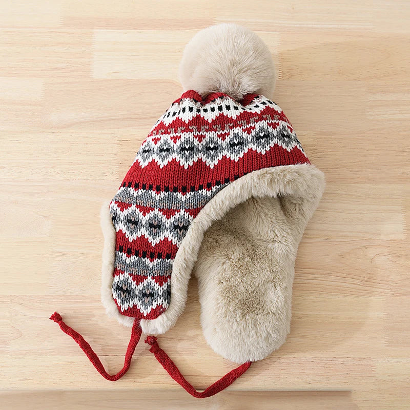 Sidney - SiberianSnug Gebreide muts met imitatiebontvoering en toef voor winterse warmte