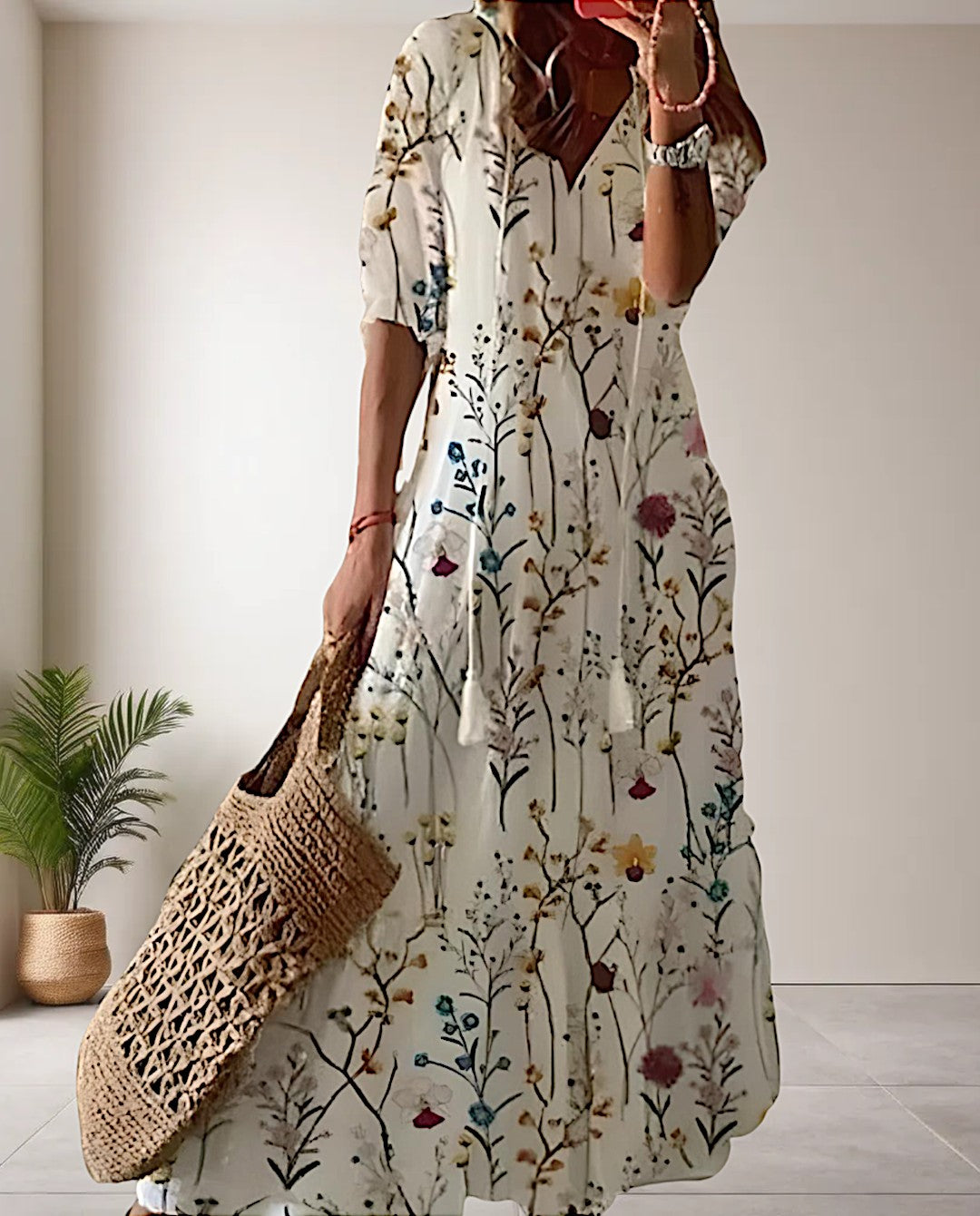 Linda - Bohemian maxi-jurk met een bloemenpatroon, halve mouwen en een verstelbaar trekkoord