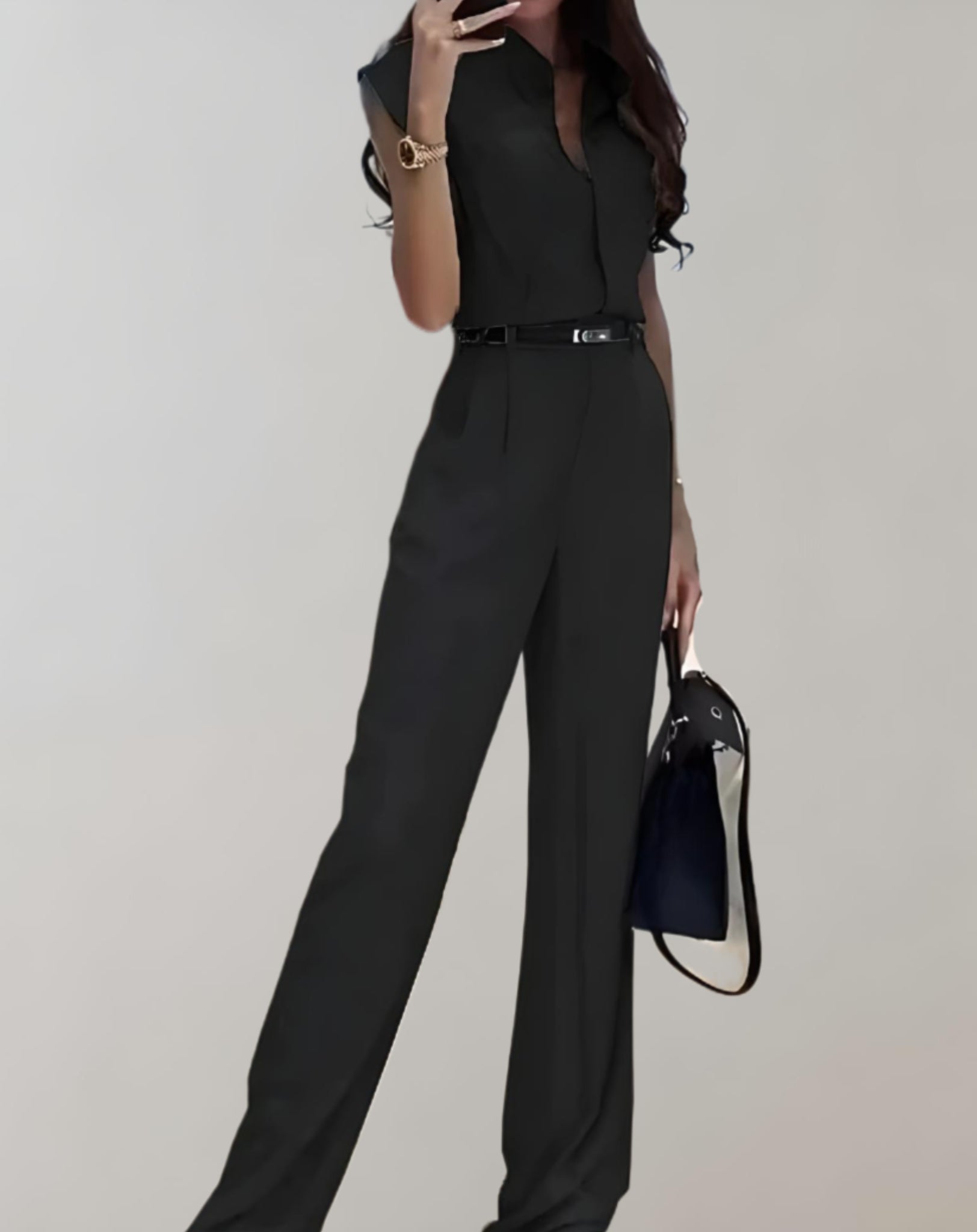 Trisha - Mouwloze jumpsuit met riem en knopen en broek met wijde pijpen