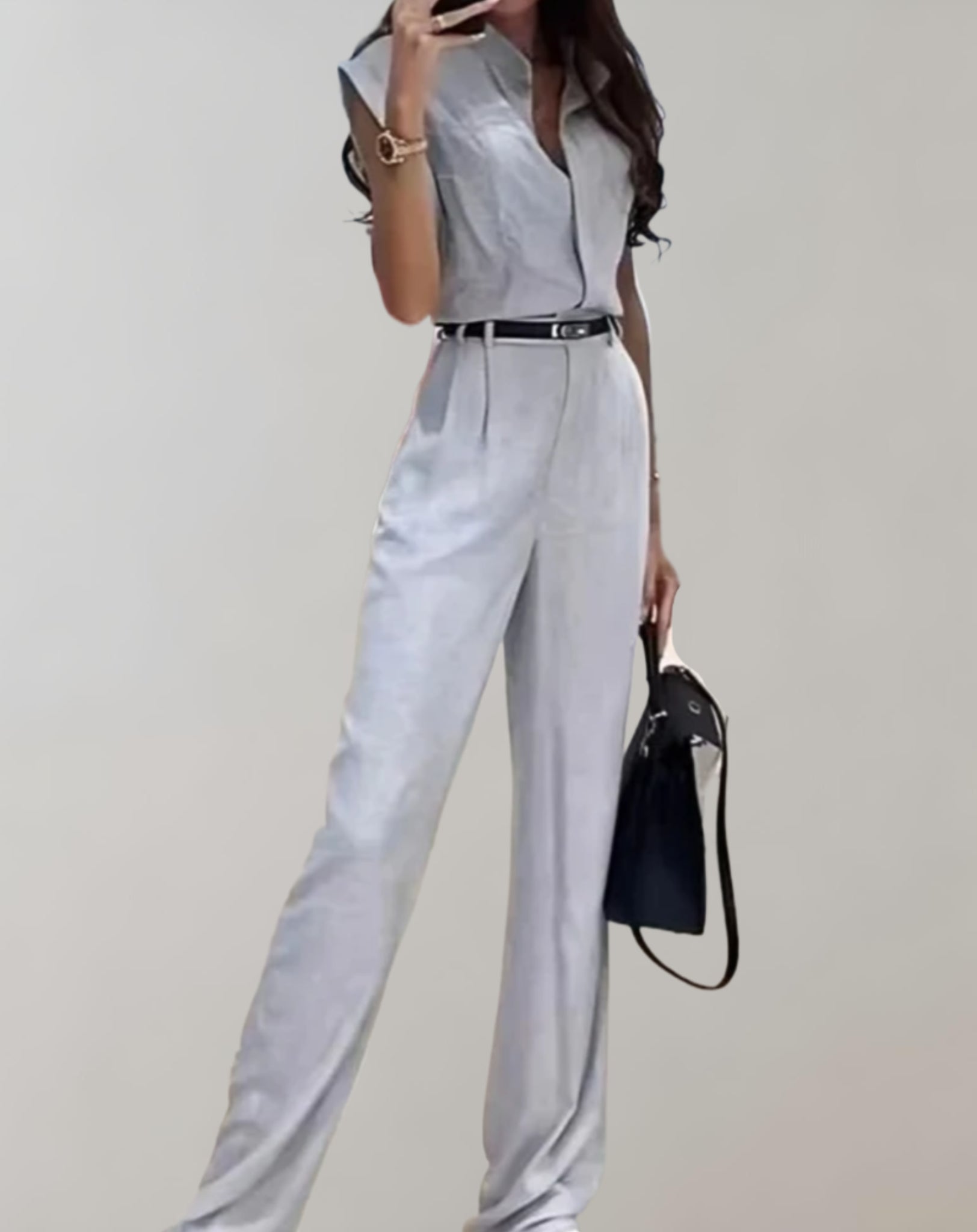 Trisha - Mouwloze jumpsuit met riem en knopen en broek met wijde pijpen