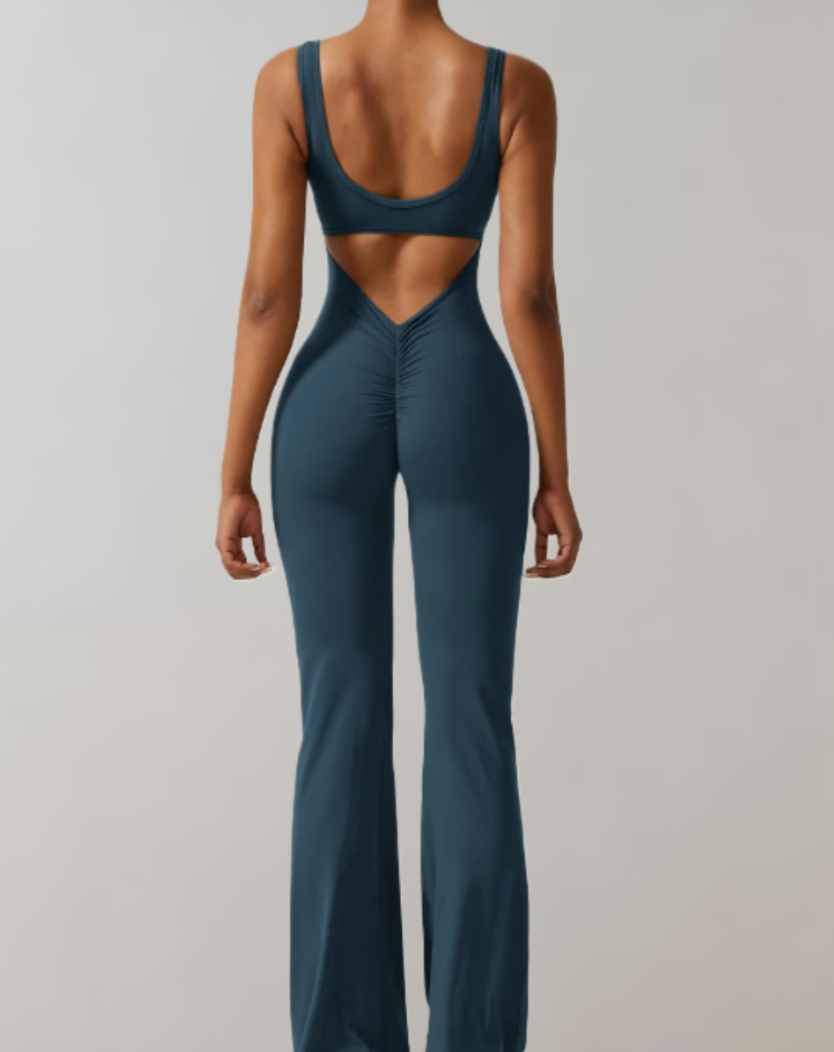 Marny - bodycon jumpsuit met mouwloze en rugloze details met een broek met klokmouwen