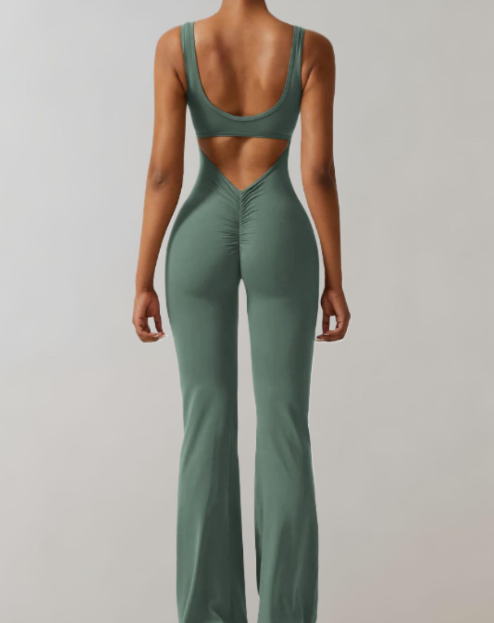 Marny - bodycon jumpsuit met mouwloze en rugloze details met een broek met klokmouwen