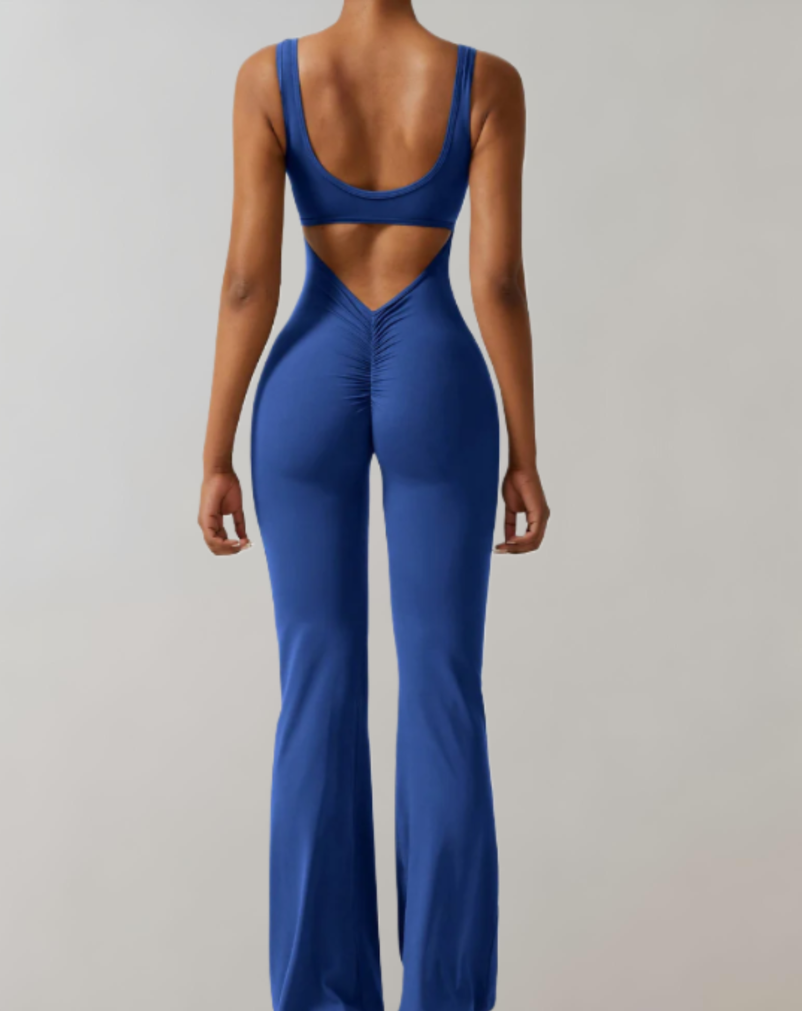 Marny - bodycon jumpsuit met mouwloze en rugloze details met een broek met klokmouwen